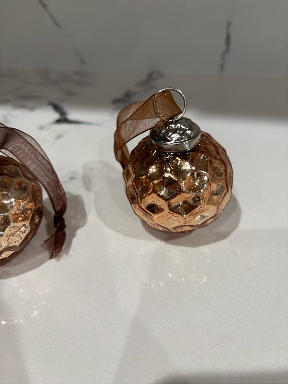 Shiny Rose Gold Textured Glass Ornament with Brown Ribbon